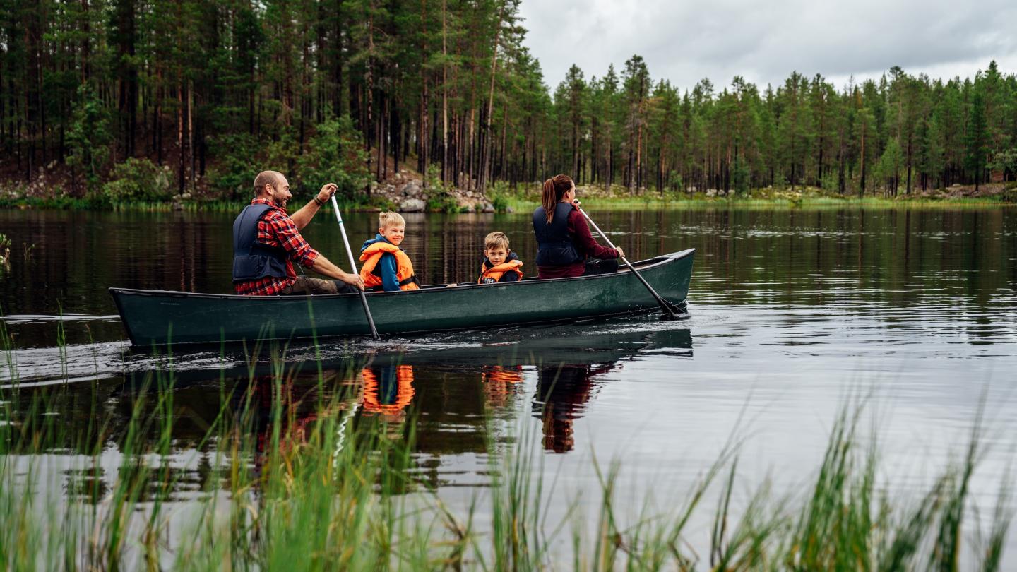 A family is canoeing.