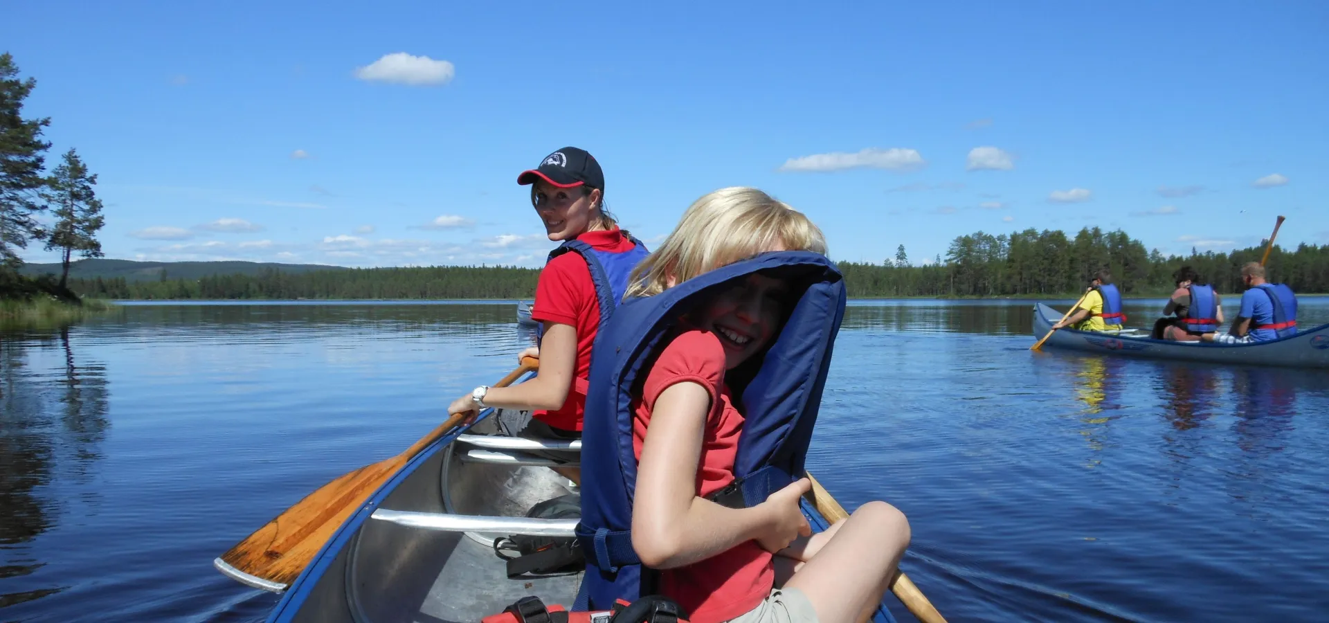 Two children on a kayak.