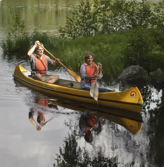 Two people canoeing.
