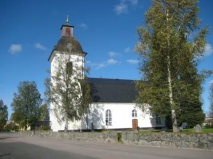 White church with tower.