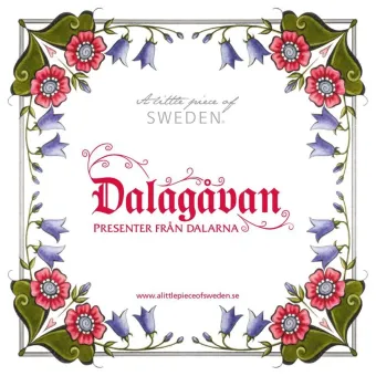 Låda med blåklockor och röda blommor med text Dalagåvan.