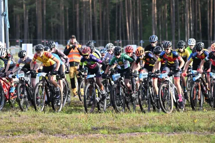 Many cyclists in competition.